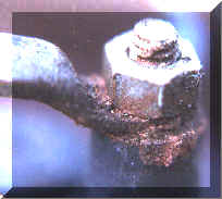 battery terminal treated with copper compound